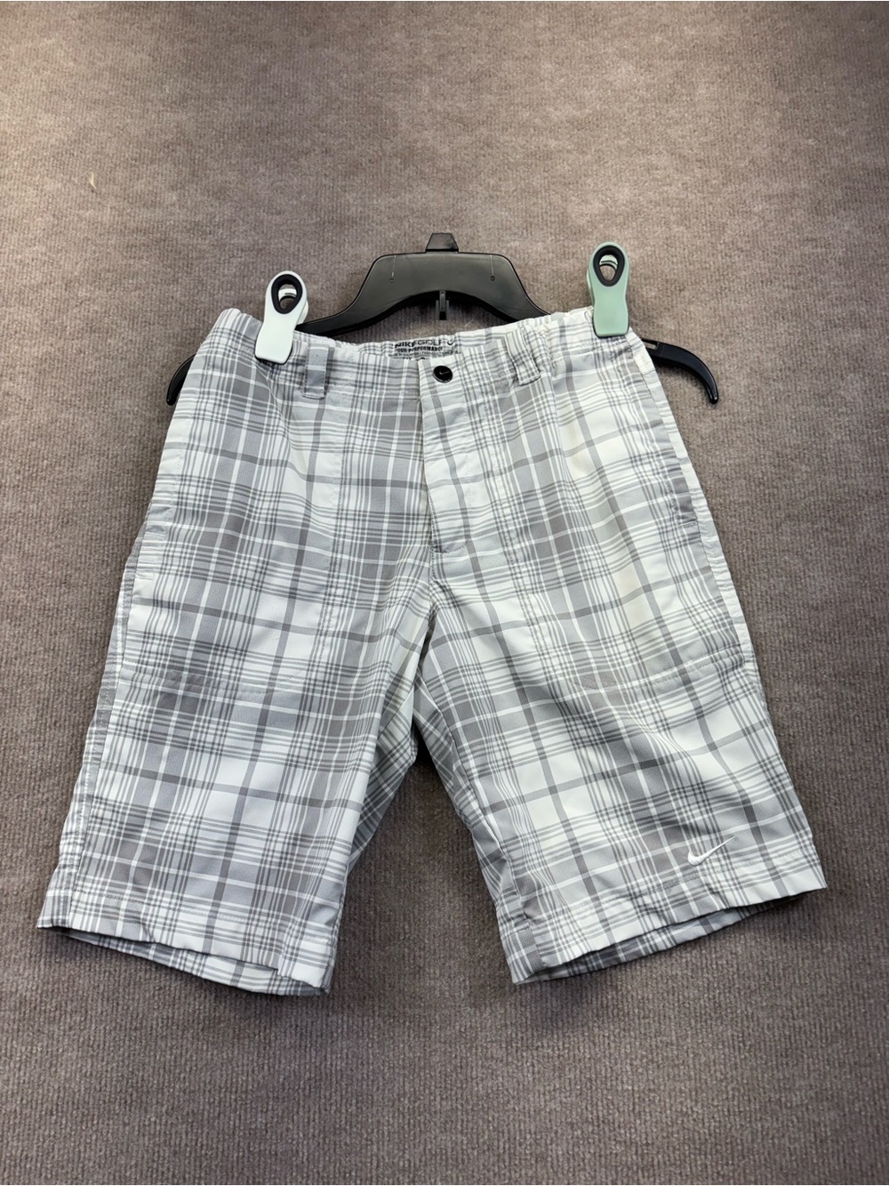 Nike Golf Tour Performance grey and white plaid Dri-FIT shorts featuring a butto